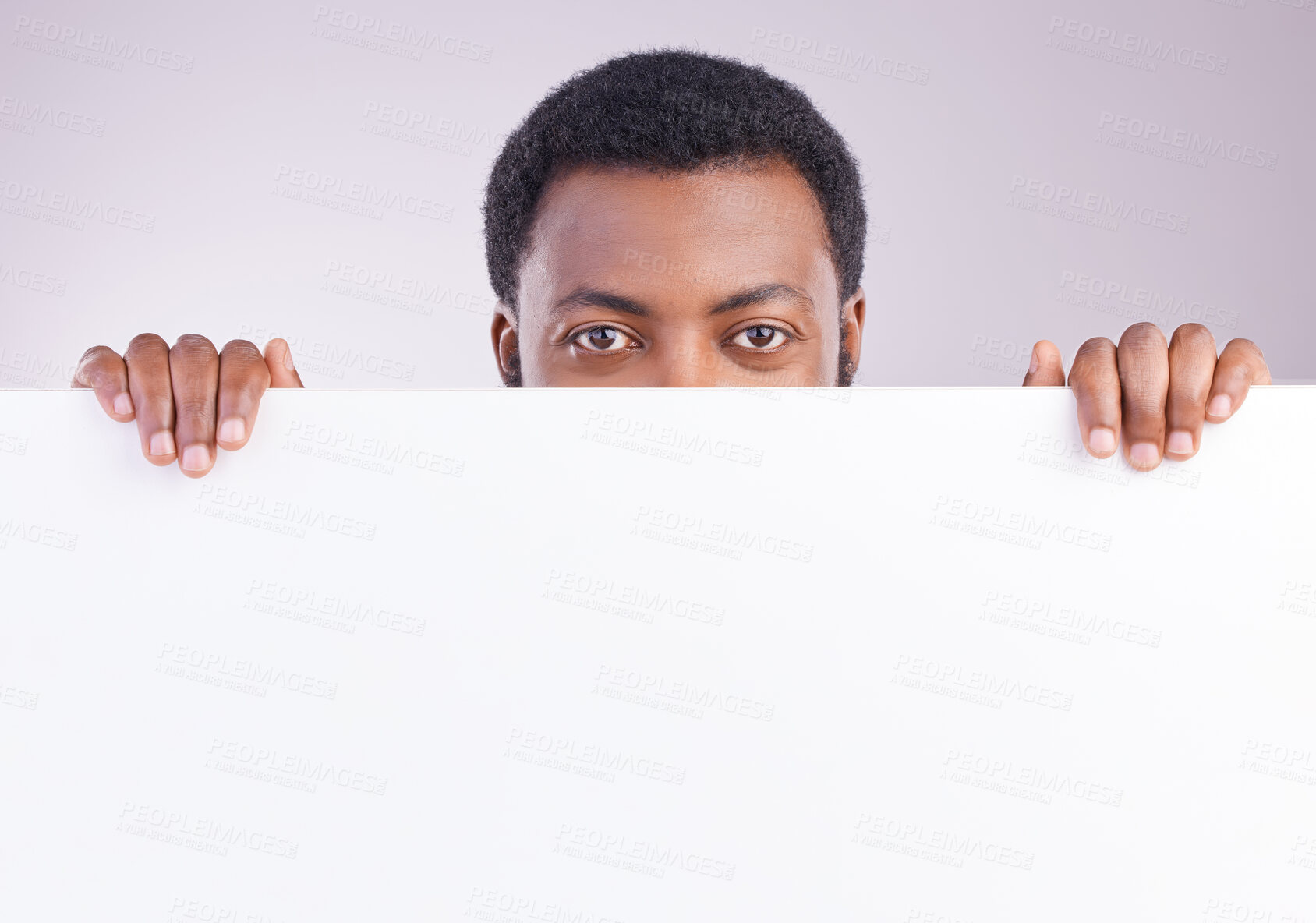 Buy stock photo Mockup, space and portrait of a black man with a board isolated on a white background in a studio. Showing, branding and an African person peaking from a blank poster with mock up for advertisement