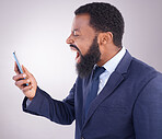 Business black man, angry phone call and studio with bad deal, mistake and frustrated by white background. Corporate, african businessman and smartphone for shouting with anger, stress and anxiety