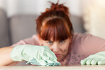 Woman, hands and cleaning table in housekeeping for bacteria or germ removal at home. Hand of female cleaner wiping surface of microscopic particles for clean hygiene and furniture disinfection