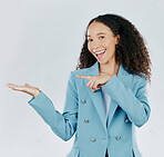 Business woman, studio and hand with space for product placement, sale or promotion deal. Happy female show hands or palm gesture for mockup, branding or advertising isolated on a white background