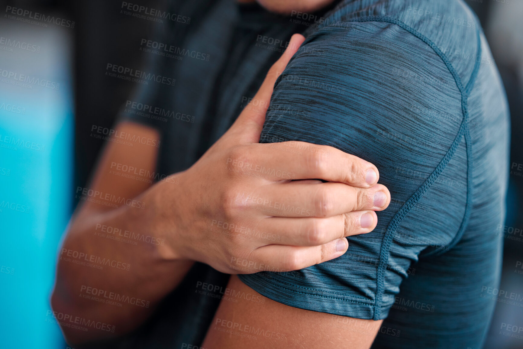 Buy stock photo Hand, shoulder and injury with a sports man holding a joint in pain while training in a gym for health. Fitness, accident or anatomy with a male athlete suffering from an injured body during exercise