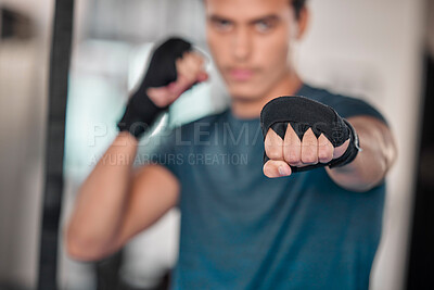 Buy stock photo Man, hands and fists for boxing fitness, fight or strength training exercise, workout or martial arts at gym. Fist of male boxer or fighter ready for fighting challenge, practice or punching indoors