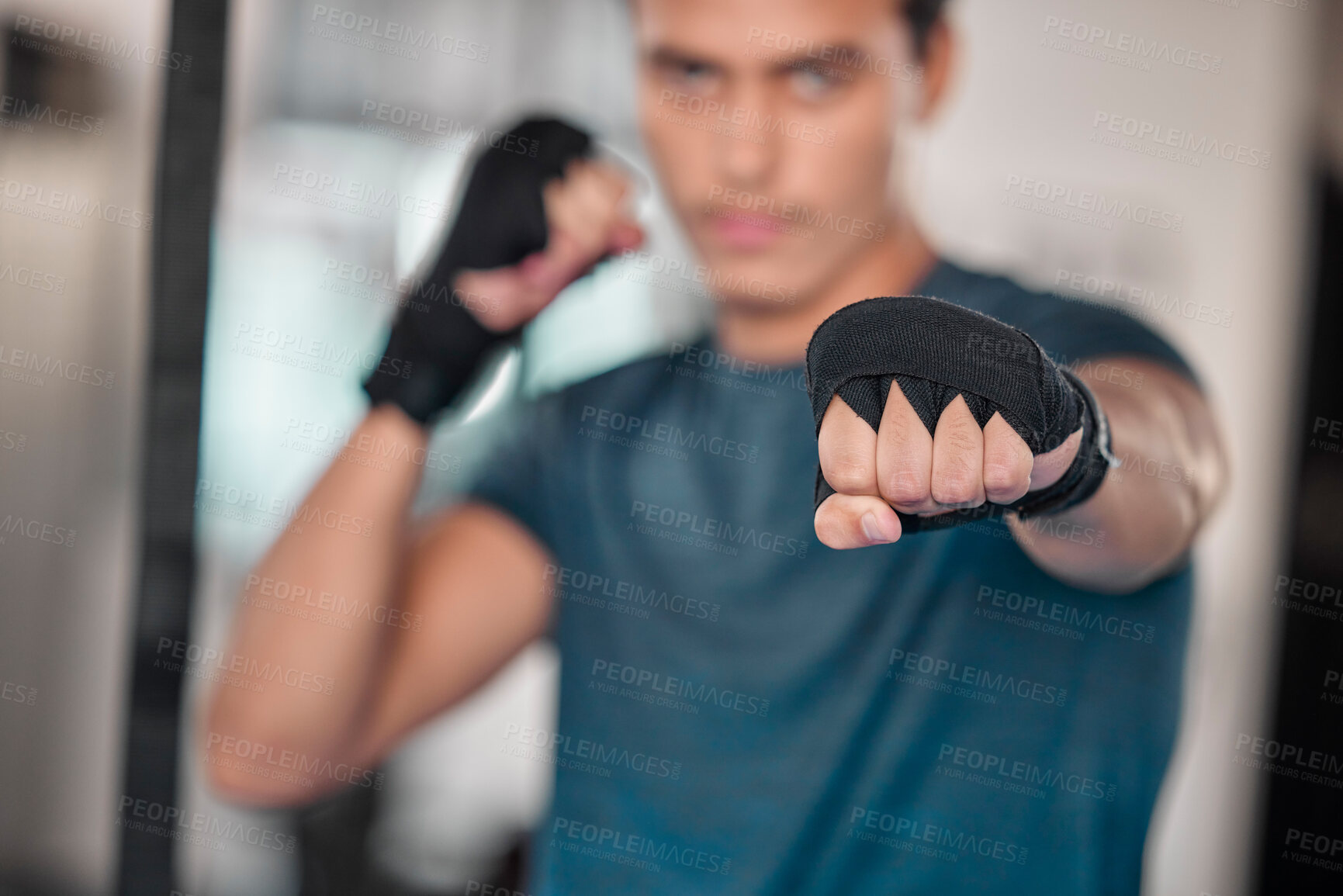 Buy stock photo Man, hands and fists for boxing fitness, fight or strength training exercise, workout or martial arts at gym. Fist of male boxer or fighter ready for fighting challenge, practice or punching indoors