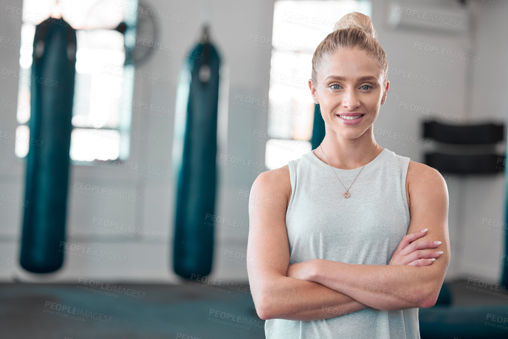 Buy stock photo Portrait, gym and smile of woman with arms crossed ready to start workout, training or exercise. Sports, fitness and happy, proud and confident female athlete from Canada preparing for exercising.