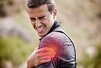 Sports, injury and man with pain in shoulder outdoors after exercise, training and workout in nature. Fitness, medical emergency and male athlete with joint inflammation, muscle ache and tendinitis 