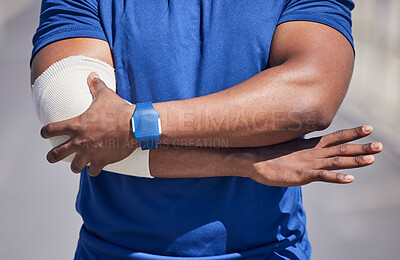 Buy stock photo Black man, arm pain and injury, first aid bandage and health, medical emergency with muscle tension. Wound, inflammation and swollen joint, arthritis or fibromyalgia, painful elbow with injured male