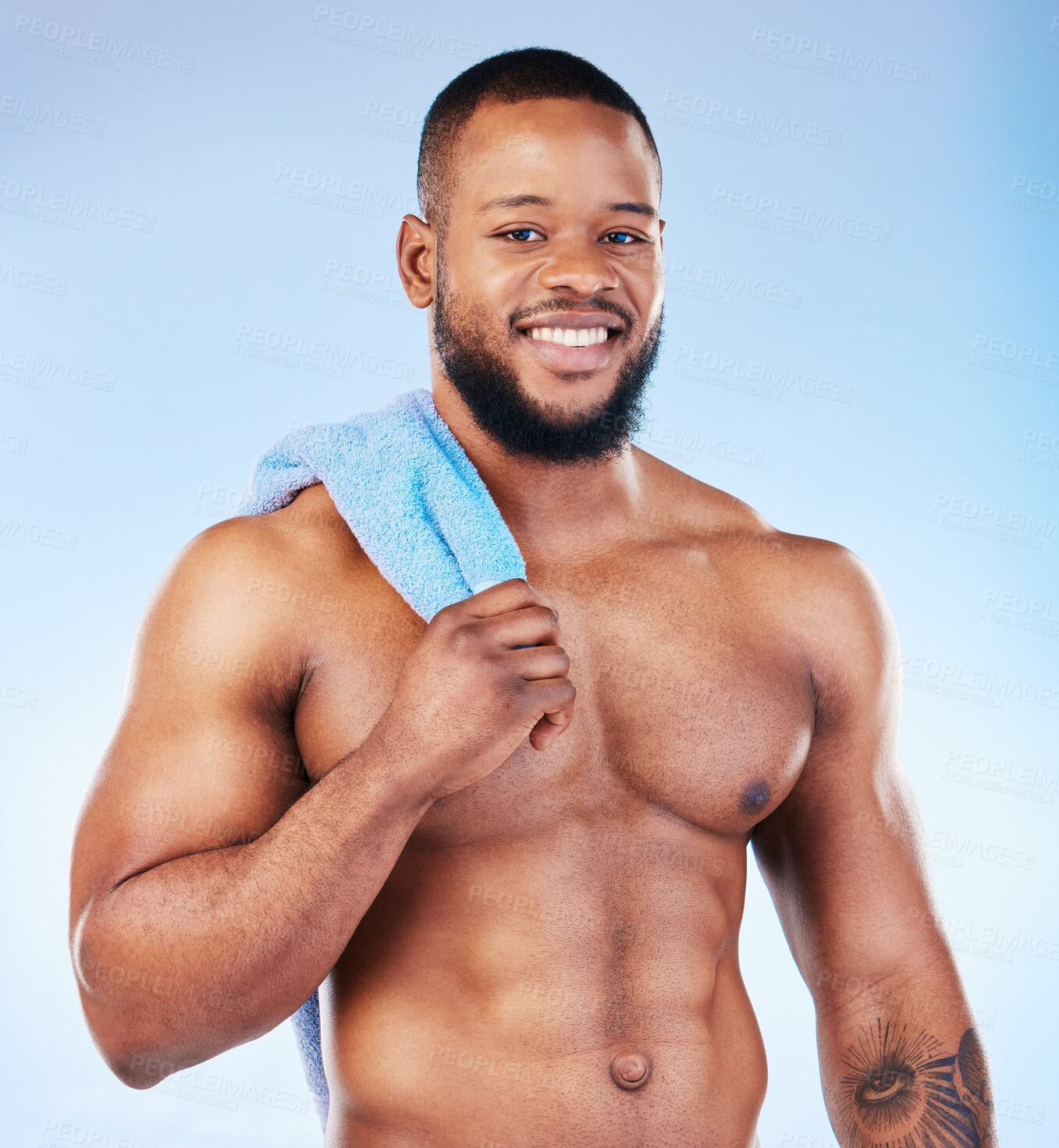 Buy stock photo Towel, shower and skincare portrait of a black man with happiness from bodybuilder muscle. Cleaning, self care and wellness from gym workout and exercise with isolated, studio and blue background