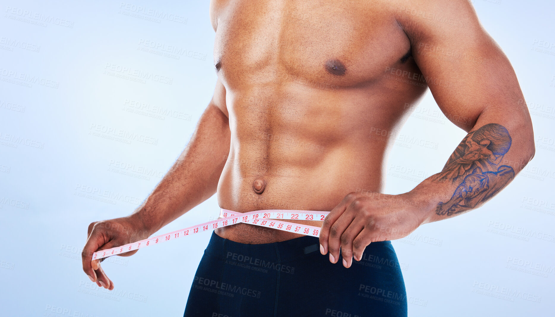 Buy stock photo Black man, fitness and body, measuring tape and abs with health, weight loss and active lifestyle on blue background. Shirtless male bodybuilder, exercise and wellness with diet, healthy and strong