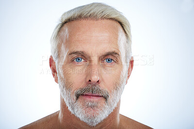 Buy stock photo Old man, face and serious with beauty and grooming, hygiene and skin isolated on studio background. Portrait, facial and mockup space with senior male, anti aging cosmetic care and dermatology