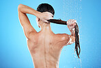 Shower, woman squeezing hair from back and blue background in morning bathroom routine, hygiene and studio mockup. Healthy haircare, wellness and fresh beauty model cleaning in water with mock up.