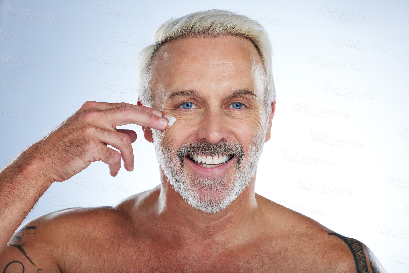 Buy stock photo Senior man, lotion and portrait, face with skincare and beauty, hygiene and grooming on studio background. Cream, moisturizer and dermatology, anti aging cosmetic care and male with smile in closeup