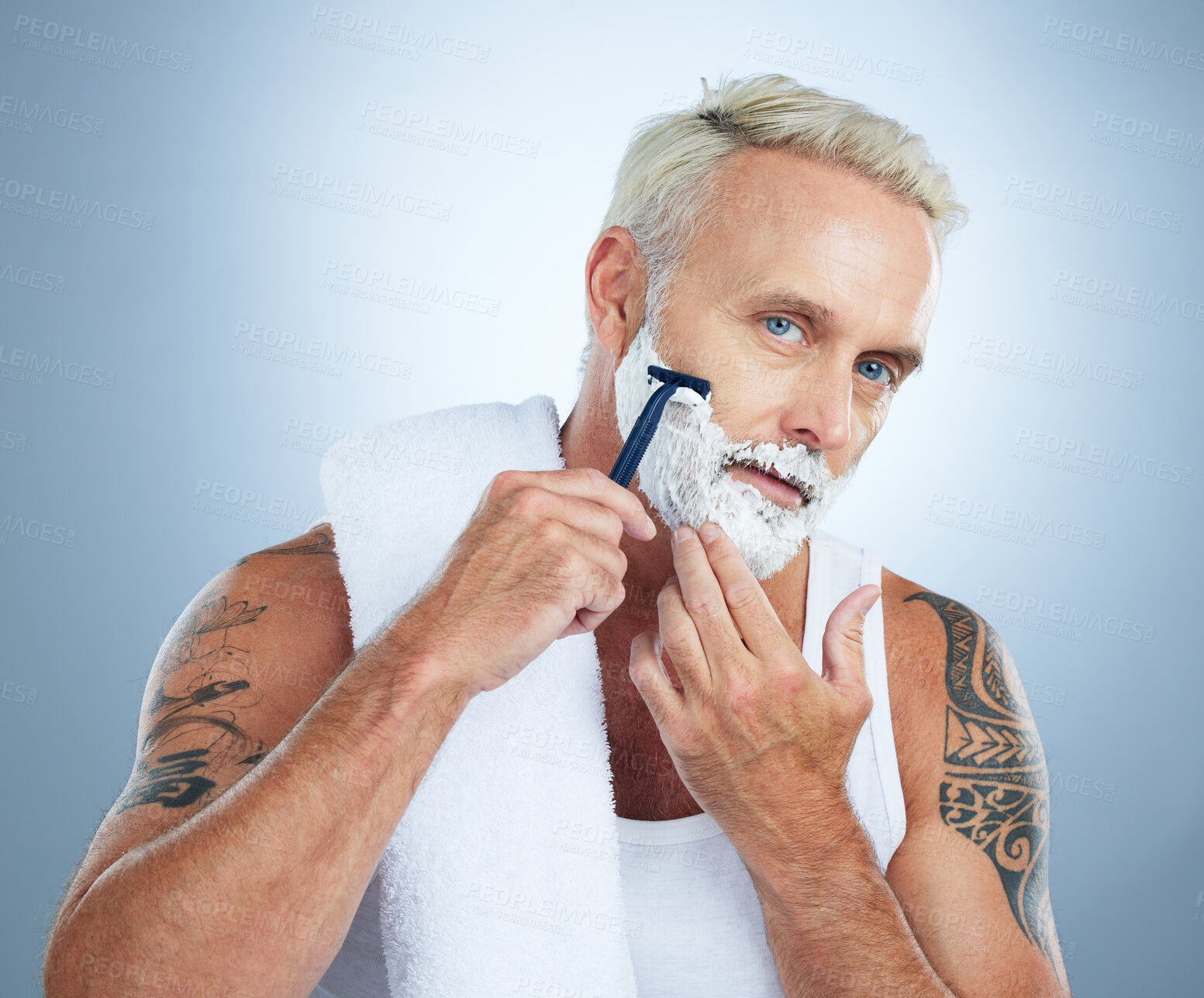 Buy stock photo Senior man, razor and shaving cream for skincare grooming, beard or hair removal against a studio background. Portrait of mature male with shaver, creme or foam for clean facial treatment on mockup
