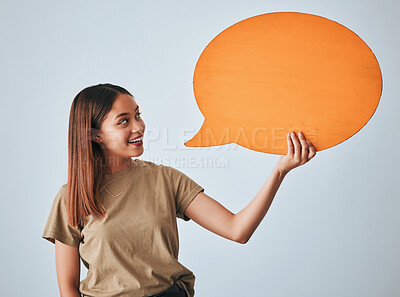 Buy stock photo Speech bubble, smile and woman with mockup in studio isolated on a white background. Social media, poster and happy girl with billboard for voice, opinion or branding, marketing or advertising space.