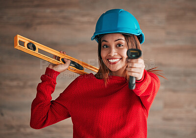 Buy stock photo Construction, business woman and portrait of a property management worker with engineer tools. Safety helmet, smile and engineering stud detector for a home renovation project with a female employee