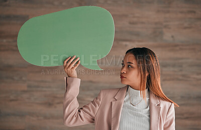 Buy stock photo Business woman, speech bubble and wall background, blank sign for social media chat or notification. Professional person holding empty sign for announcement, info or opinion on ideas for startup chat