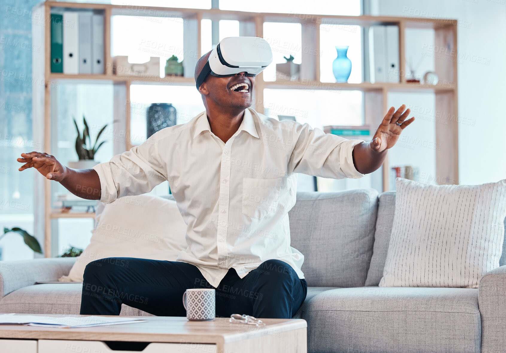 Buy stock photo Virtual reality glasses, man and happy in house for cyber experience, metaverse interface or video game. Black male, VR and games in lounge for future innovation, ui technology and excited simulation