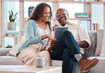 Mature couple, tablet and sofa for laugh in living room with bond, love or video on app for memory. Black man, woman and mobile touchscreen for funny movie on web in house on lounge couch to relax