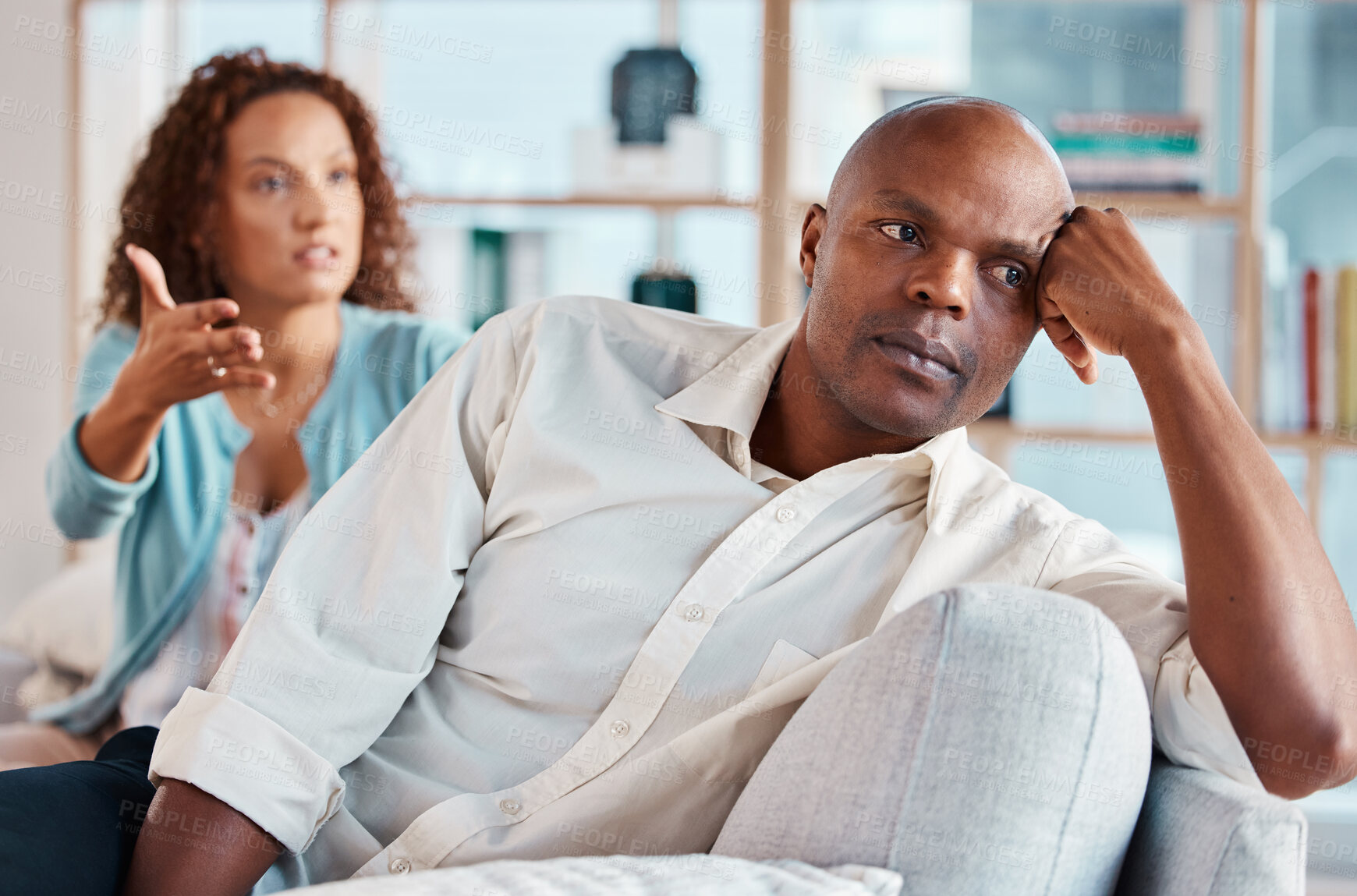 Buy stock photo Couple, fight and ignore on sofa for problems, breakup and bad communication in lounge. Divorce, crisis and frustrated people in conflict, angry partner and betrayal of cheating, drama and depression