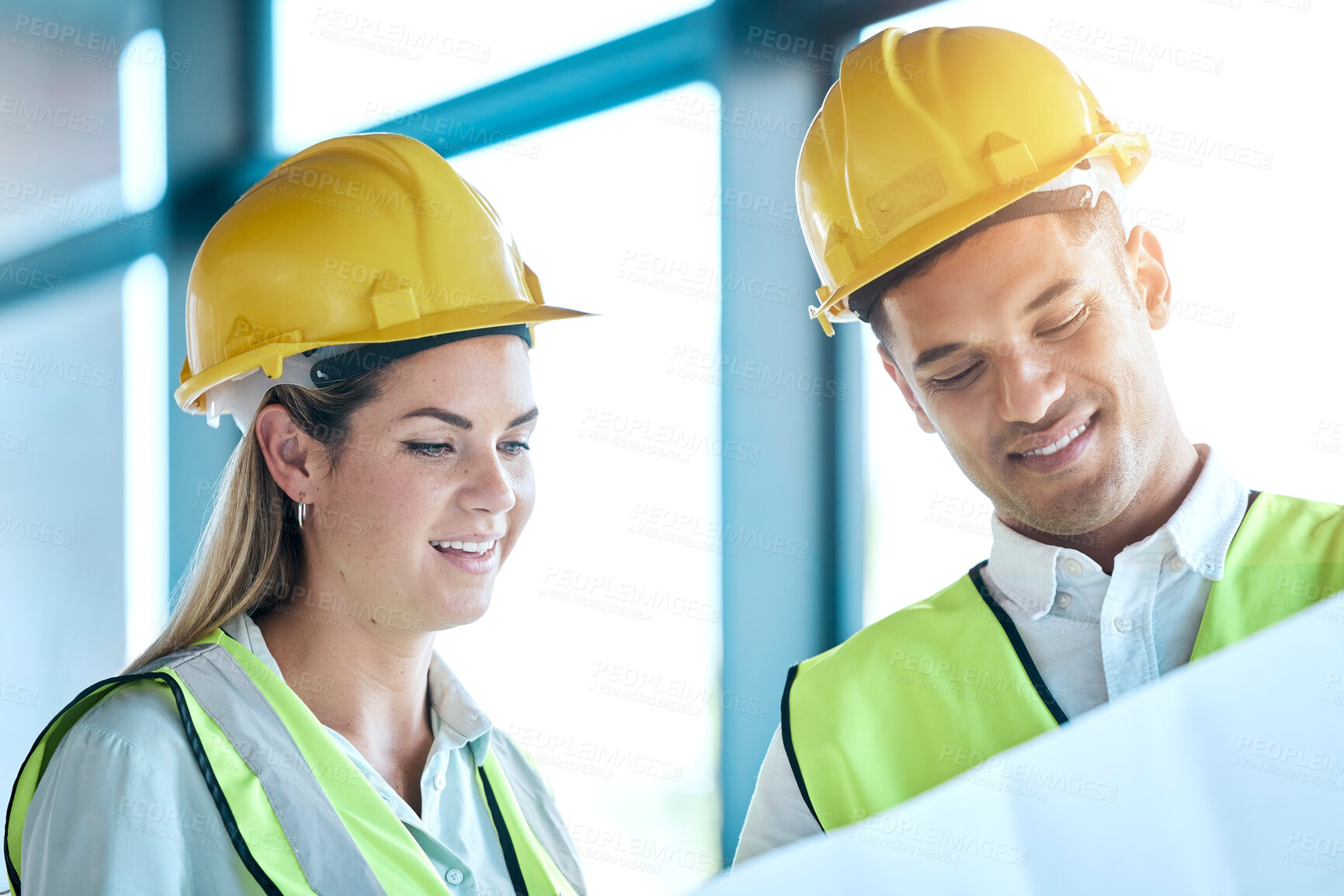 Buy stock photo Architect, team and planning with blueprint for construction or architecture with smile for on site project. Man and woman contractors in building floor plan or teamwork strategy with safety helmets