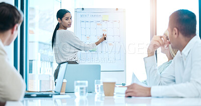 Buy stock photo Business people, coaching and meeting on whiteboard for schedule planning with calendar for daily tasks at office. Female coach training staff for team reminder or weekly planner in conference room