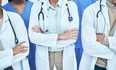 Buy stock photo Hands, doctors and group with arms crossed in hospital or clinic for teamwork. Collaboration, nurses or confident medical professionals or people with pride for healthcare, wellness or diversity.