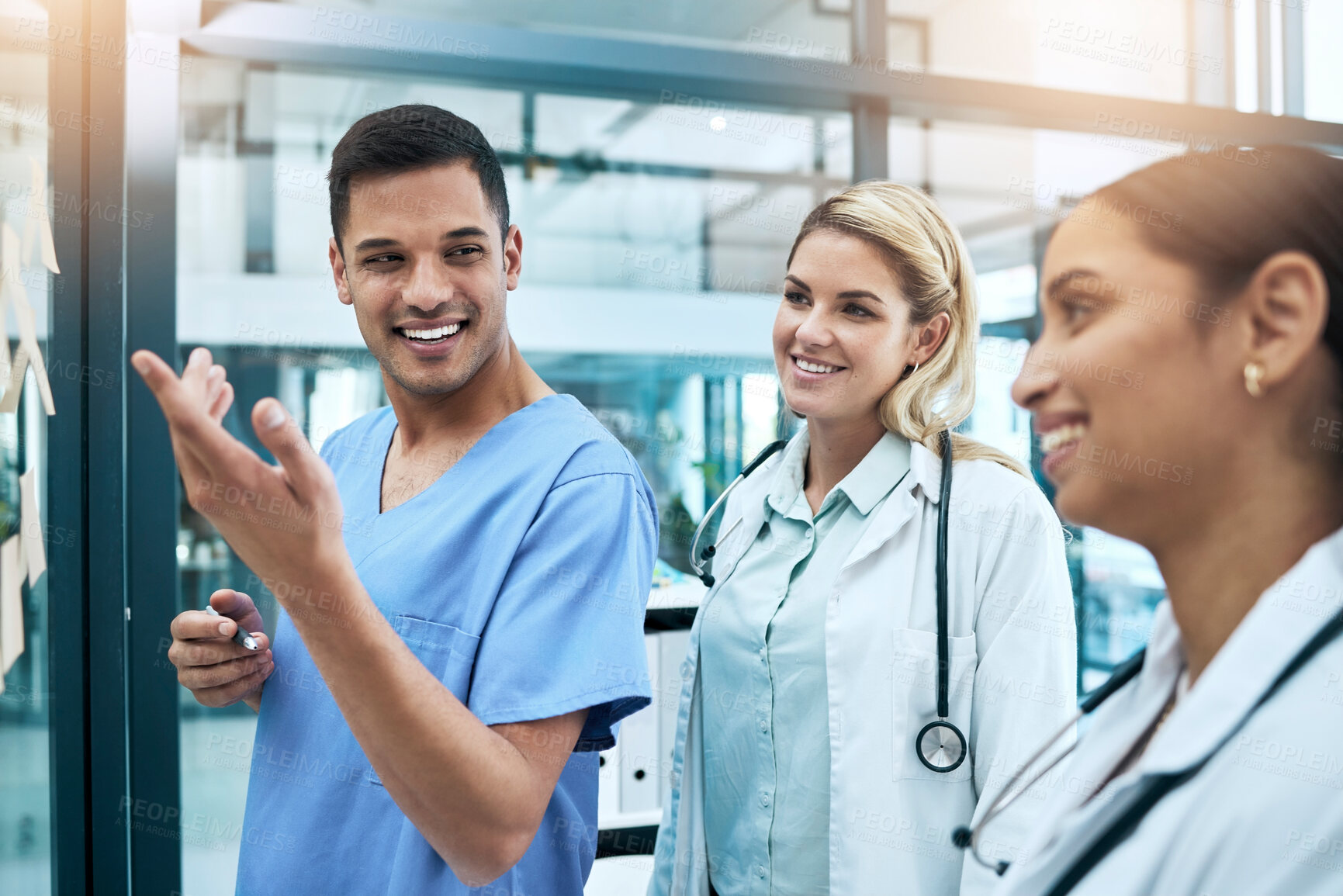 Buy stock photo Doctor, team and coaching in healthcare planning, meeting or brainstorming on glass board at hospital. Group of medical professionals in teamwork, strategy or sharing ideas in presentation at clinic