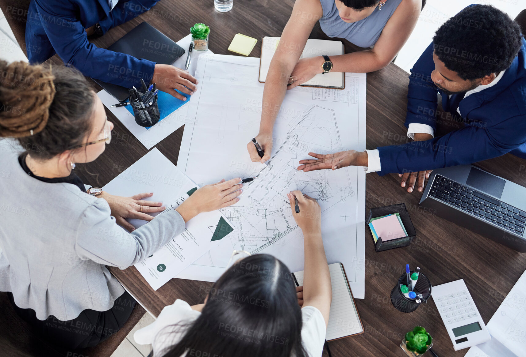 Buy stock photo Business people, hands and planning construction above in meeting for team collaboration at office. Hand of architect group in teamwork strategy, brainstorming or discussing floor plan at workplace