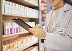 Hands, tablet and stock in a pharmacy with a woman drugstore at work, checking shelves for a product. Healthcare, medicine and trust with a female pharmacist working in a store for the sale of drugs