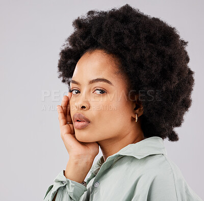 Buy stock photo Beautiful, serious and portrait of a black woman with an afro isolated on a white background in a studio. Skincare, calm and face of an African girl with a glow, looking confident and relaxed