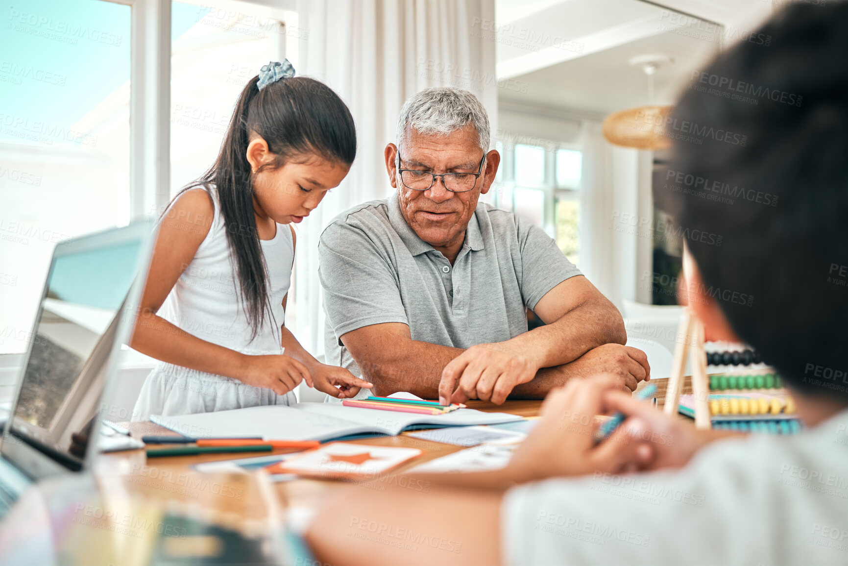Buy stock photo Education, learning and family together with homework, academic material and senior man with children studying. Grandfather helping kids, learn and development with growth, study and school