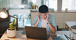 Laptop, business asian man and stress, tired or headache working in office with fatigue, anxiety or depression. Sad, depressed and mental health risk of digital online worker or employee burnout and crisis