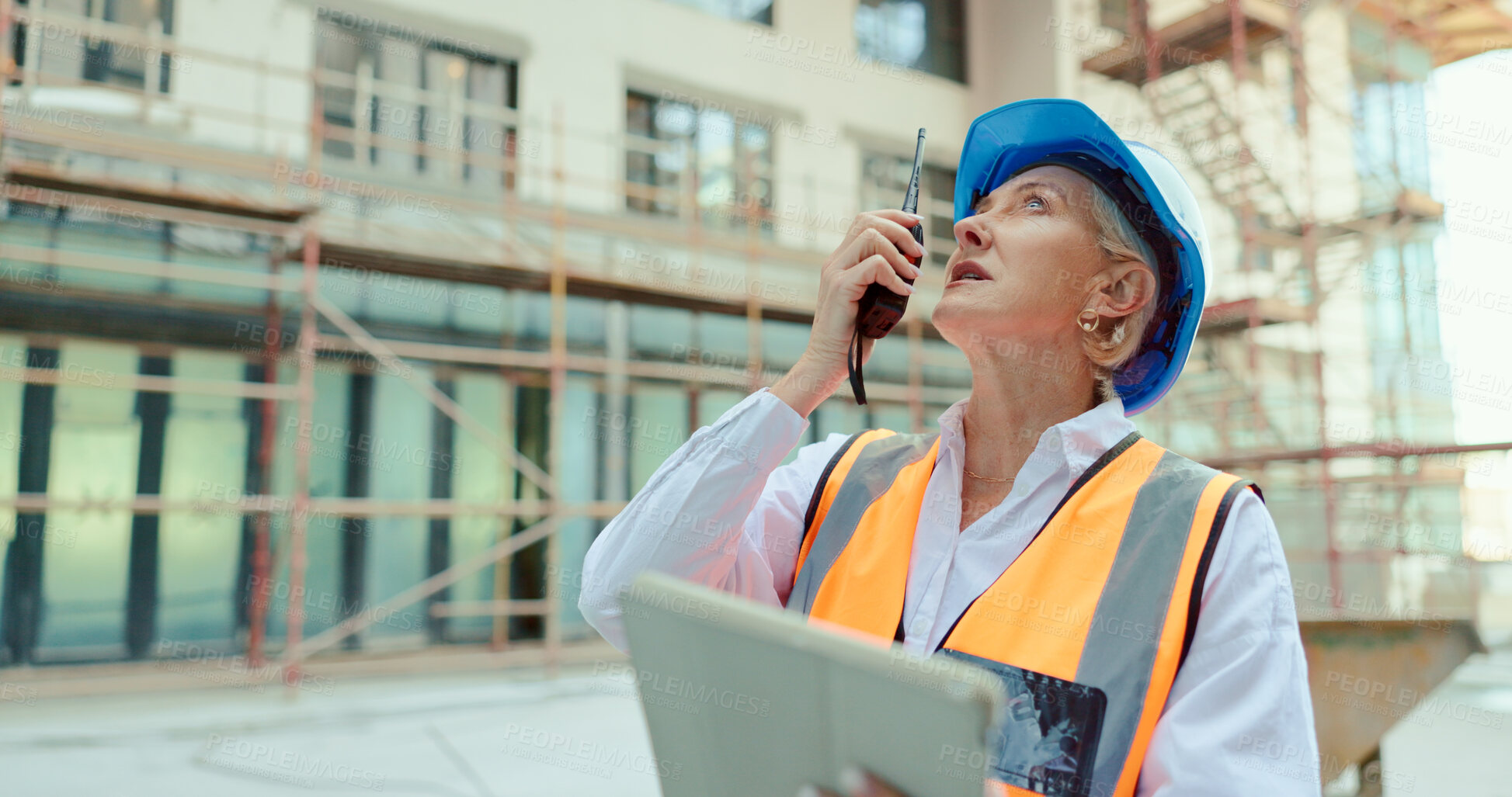 Buy stock photo Construction site, walkie talkie and talking woman, architect and planning infrastructure, civil engineering or property innovation. Radio, industrial or contractor discussion on building development