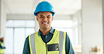 Construction, building and construction worker, man and smile in portrait, employee at construction site with work vest and safety helmet. Working, architecture industry and renovation job.