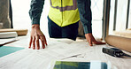 Hands of architect check blueprint at construction site for building, house or real estate industrial development. Architecture industry man, engineer and contractor inspection of project design plan