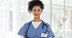African American Women, face and doctor smile for healthcare, vision or career ambition and advice at the hospital. Portrait of happy and confident Japanese medical expert smiling, phd or medicare at the clinic