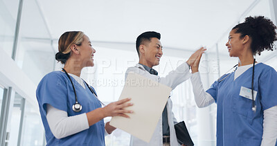 Buy stock photo Doctor, people and high five in teamwork, winning or healthcare success together at hospital. Group of medical professional touching hands in team achievement, promotion or motivation at clinic