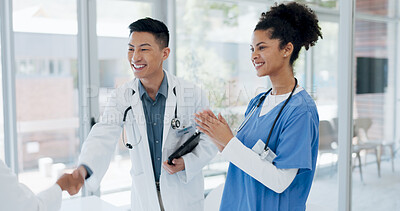 Buy stock photo People, doctor and handshake in meeting, introduction or teamwork for onboarding greeting at hospital. Happy man, medical or healthcare nurse shaking hands in deal, agreement or promotion at clinic