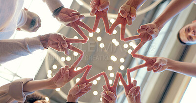 Buy stock photo Star, hands and group with a sign together for sun and team building gesture from below in business, office or workplace. Peace, people and community with collaboration, creativity and teamwork