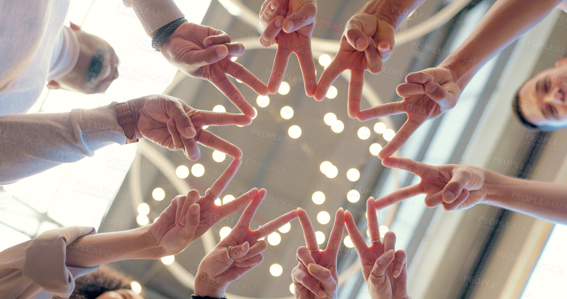 Buy stock photo Star, hands and group with a sign together for sun and team building gesture from below in business, office or workplace. Peace, people and community with collaboration, creativity and teamwork