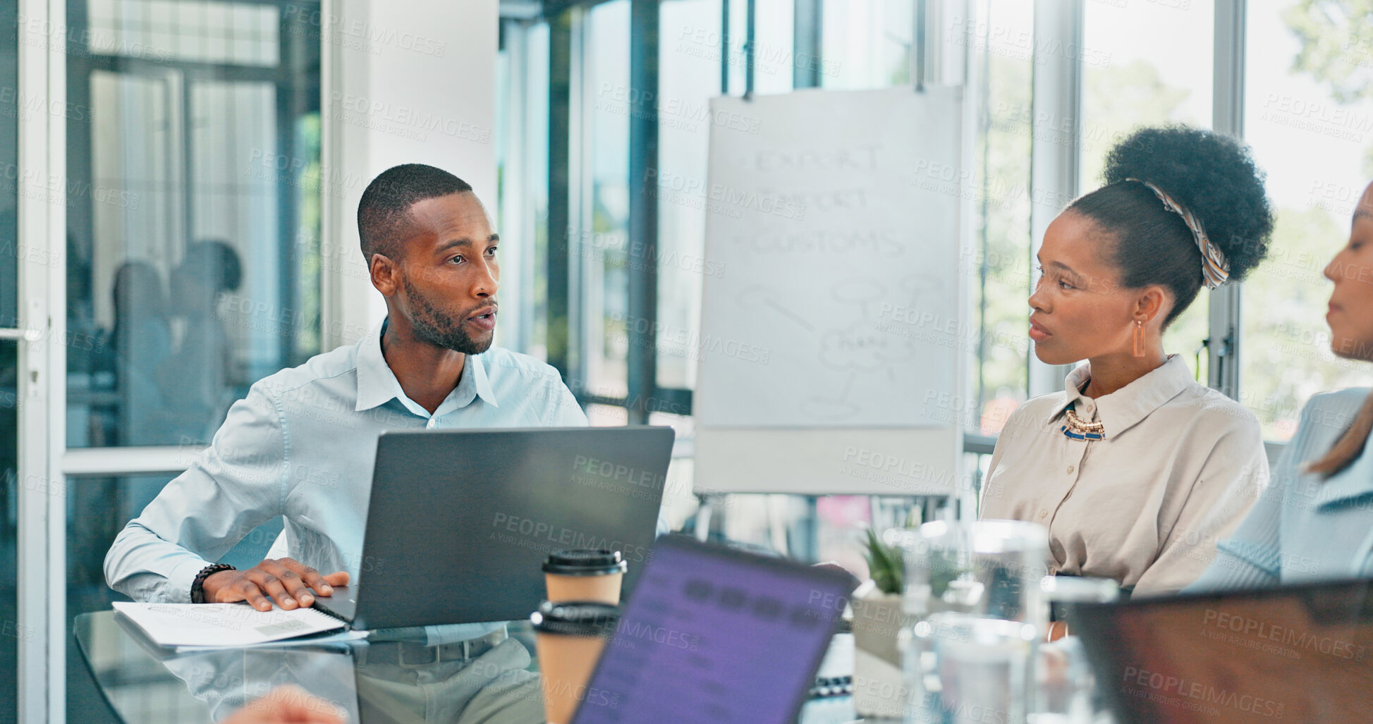 Buy stock photo Business people, leader and black man in a meeting, brainstorming and planning with laptop, idea or cooperation. African person, employees or manager with a pc, collaboration or project with feedback