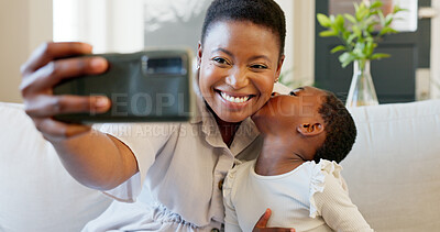 Smartphone, selfie and mother with child on living room sofa for social media post, parents blog update or family home celebration. Black family smile in cellphone portrait photography for online app