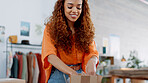 Fashion designer, clothes or packaging in logistics boxes in retail order, shipping delivery or boutique stock export. Smile, happy or small business owner in fabric production workshop or gift store