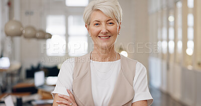 Elderly woman, face and smile with arms crossed for corporate leadership, management or vision at office. Portrait of confident senior female CEO manager smiling with crossed arms for career startup