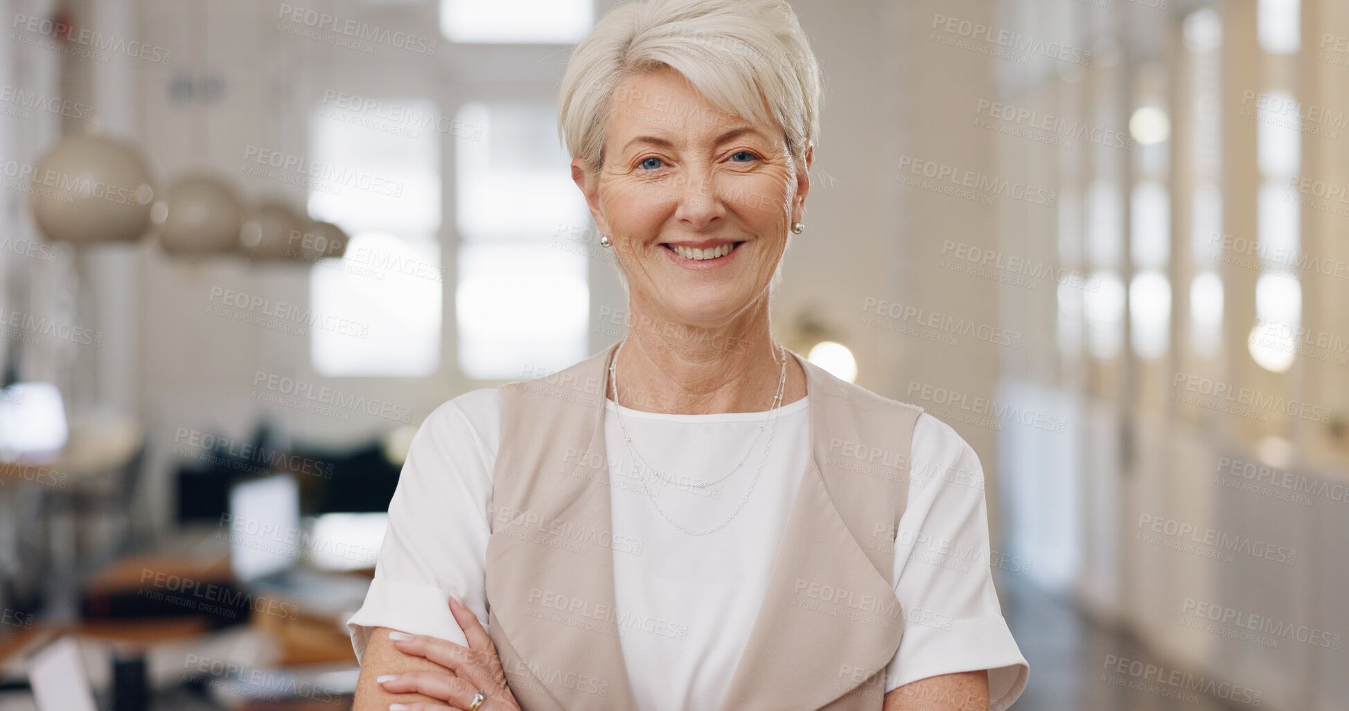 Buy stock photo Smile, crossed arms and portrait of senior businesswoman in office with confident and positive attitude. Happy, ambition and professional elderly female ceo, entrepreneur or boss in modern workplace.