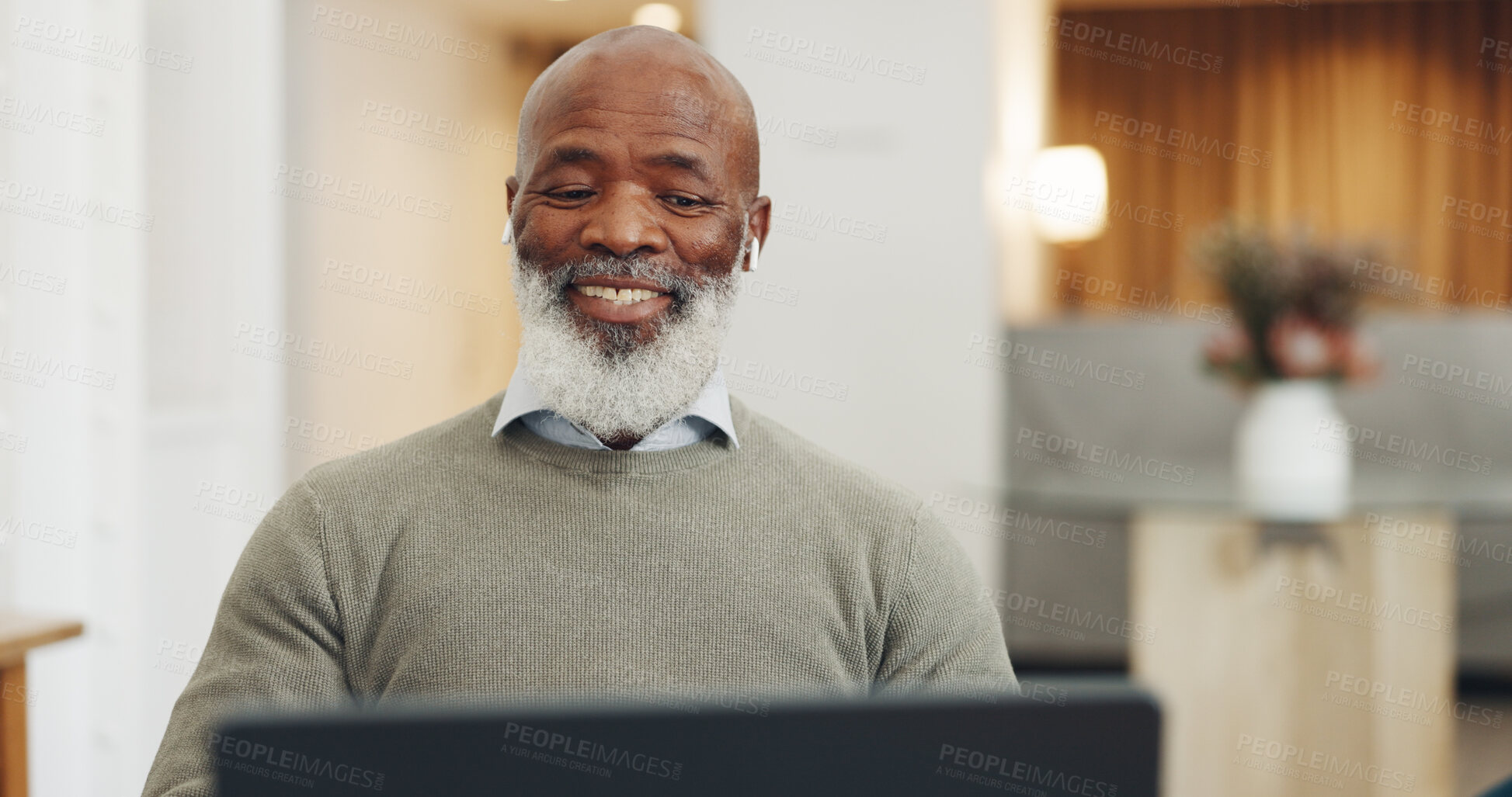 Buy stock photo Senior man, video call and home office for online meeting, business conference and training. Black man, smiling and professional consultant with headphones, computer and communication in workshop

