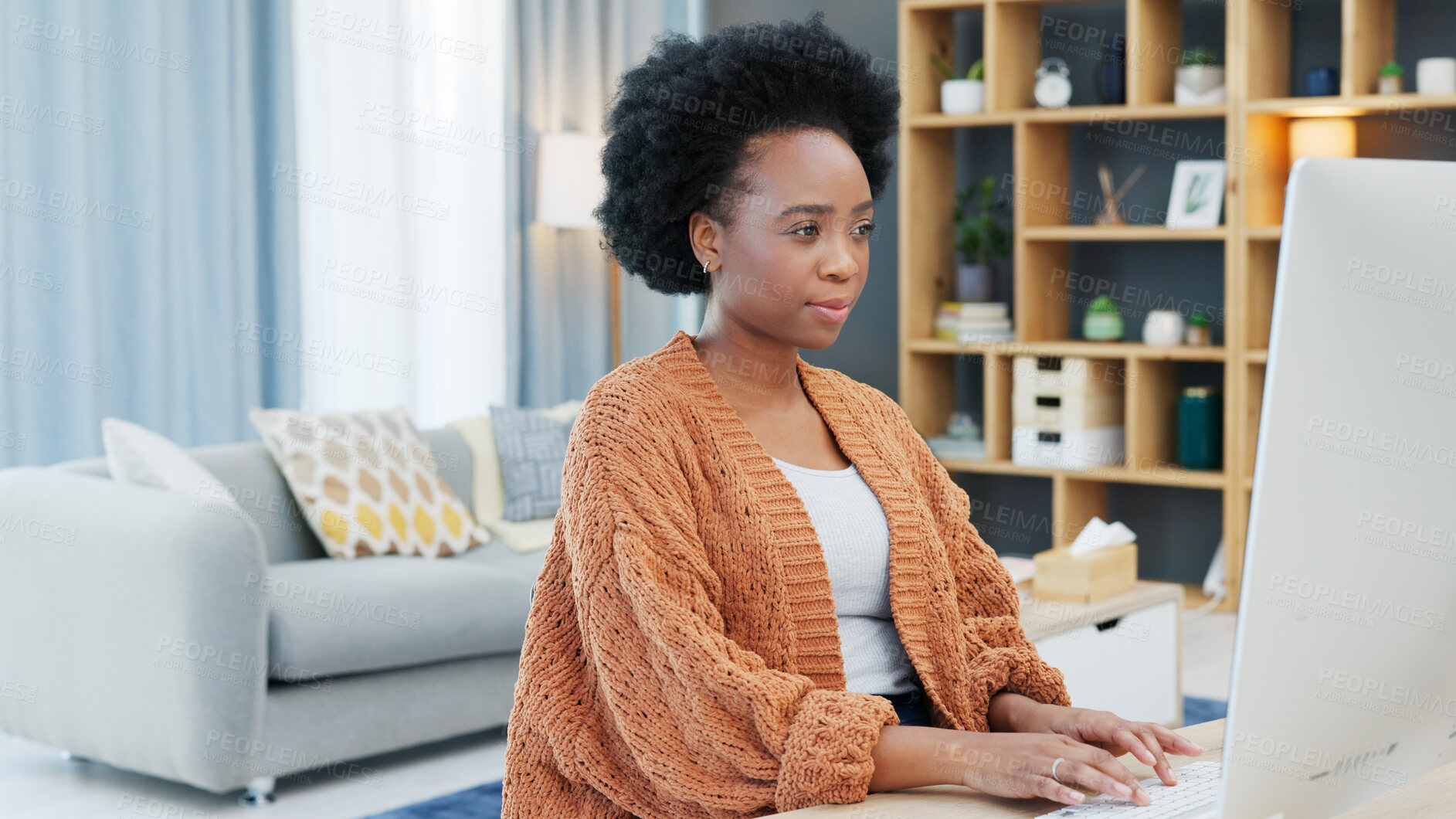 Buy stock photo Woman, entrepreneur or student for remote on computer at home. Black, person and concentrate with technology, communication and browsing for research, planning or reading on internet, web or email