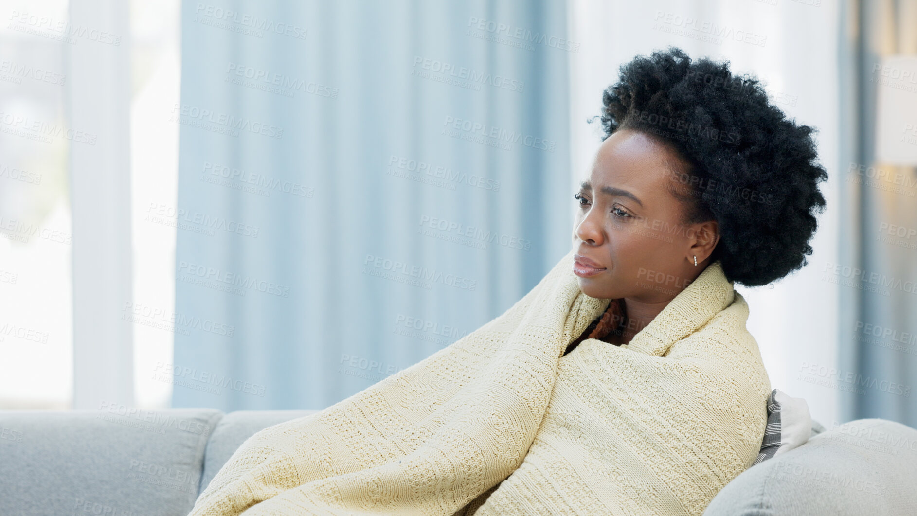 Buy stock photo Depression, anxiety and black woman on a sofa with blanket, broken heart or ptsd memory at home. Stress, broken heart and African female in a living room with mental health crisis, abuse or trauma