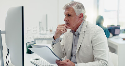 Thinking senior businessman by computer reading sales email in office workplace. Mental health, burnout and tired elderly male employee with migraine, fatigue or depression from overwork.