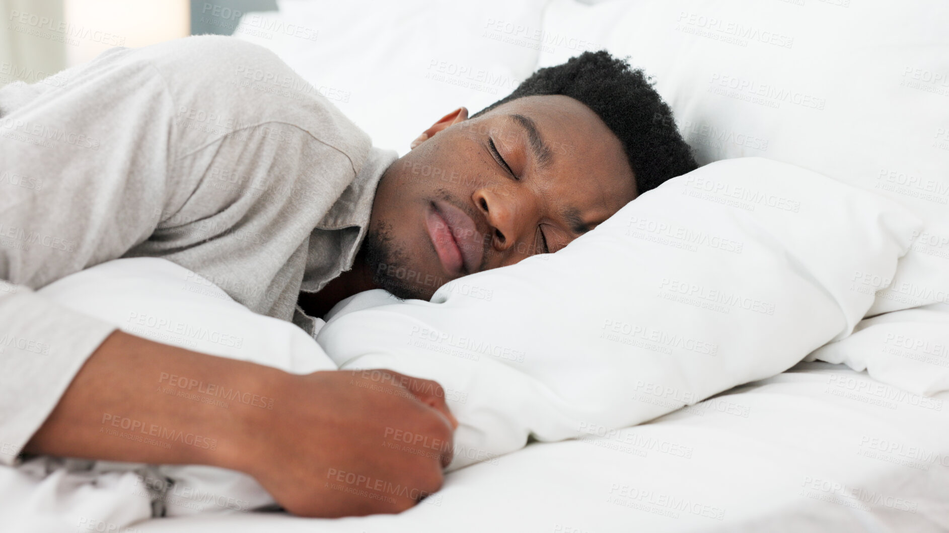 Buy stock photo Sleep, relax and black man in bed, pillow and blanket for dreaming, sleeping and comfortable at home. Morning, bedroom and closeup of tired person with eyes closed for resting, weekend and cozy