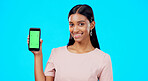 Chroma key, green screen and woman holding phone with mockup for logo, branding and mobile app advertising. Smile, happy and portrait of professional female isolated in a studio blue background